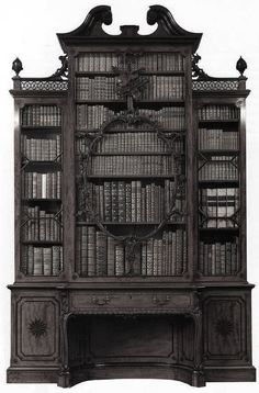 an old bookcase with many books on it