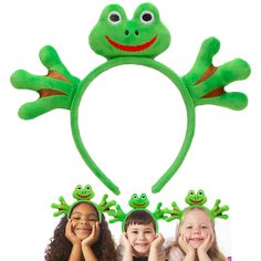 three children wearing frog hats with their hands on the ears and smiling at the camera