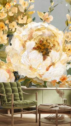 a living room scene with focus on the large flower wall mural behind the chair and coffee table