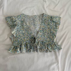 Ditsy Floral Flutter Sleeve Tie Front Top Cropped Fit Super Cute With A Bralette Underneath Size Small Nwt Summer Blue Tops With Ditsy Floral Print, Summer Blue Top With Ditsy Floral Print, Summer Beach Top With Ditsy Floral Print, Summer Beach Tops With Ditsy Floral Print, Blue Ditsy Floral Print Top For Day Out, Blue Ditsy Floral Print Short Sleeve Top, Blue Short Sleeve Top With Ditsy Floral Print, Blue Short Sleeve Tops With Ditsy Floral Print, Clothing Cabinet