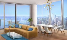 a living room filled with furniture and large windows overlooking a cityscape in the distance