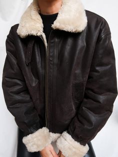 Indulge in timeless elegance with our Women's Shearling Coat, a luxurious tribute to 70s vintage style. Crafted from genuine sheepskin leather and lined with plush shearling wool, this brown shearling jacket offers unmatched warmth and comfort. With its bomber silhouette and natural shearling sherpa wool accents, it exudes sophistication and charm. Whether you're navigating city streets or heading to a cozy mountain retreat, our genuine leather shearling coat promises to elevate your winter ward Brown Shearling Jacket, Shearling Coat Womens, Jacket Fur, Coat Fur, Mountain Retreat, Penny Lane, Leather Trench Coat, Shearling Coat, 70s Vintage