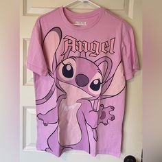 Disney Angel Stitch Short Sleeve Tee Angel Hugging Your Back Medium All Measurements Are Approximate Pit To Pit: 20.25” Length: 28.75” Nwt Purple Character Print Top For Streetwear, Purple Cartoon Print Top For Streetwear, Purple Crew Neck Top With Cartoon Print, Purple Cotton Kawaii Top, Cute Purple Tops With Relaxed Fit, Purple Character Print Short Sleeve Top, Purple Short Sleeve Top With Character Print, Cute Purple Relaxed Fit T-shirt, Cute Purple Tops With Character Print