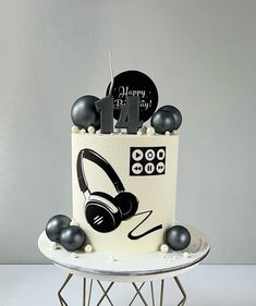 a birthday cake with headphones on it