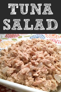 tuna salad in a white bowl with the words tuna salad on top and below it