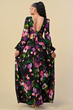 Floral print on a black background Deep V neckline, full length maxi dress, side cutouts Material: 100% Polyester V-neck Cutout Maxi Dress For Brunch, Black Printed Maxi Dress For Party, Black Printed Maxi Dress, Floral Print Maxi Dress For Night Out, Floral Print V-neck Maxi Dress For Night Out, Black Printed Floor-length Dress, Black Floor-length Printed Dress, Spring Beach Maxi Dress With Cutout Back, Fitted Black Printed Maxi Dress