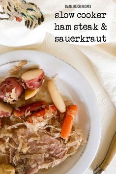 ham steak with sauerkraut,potatoes and carrots on a rustic white plate. Slow Cooker Sauerkraut, Easy Slow Cooker Ham, Food Slow Cooker, Ham And Potatoes, Ham Steak Recipes, Ham Steak, Steak And Potatoes, Sauerkraut Recipe