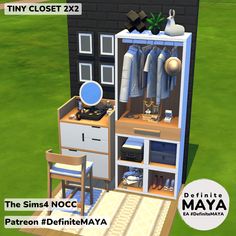 an image of a tiny closet in the middle of a yard with clothes on it