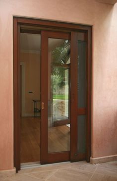 the inside of a house with glass doors