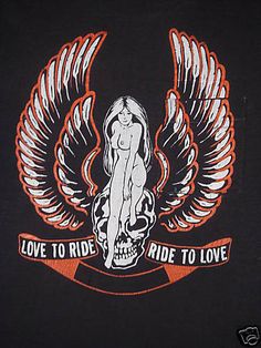 a black shirt with an image of a naked woman on the front and words ride to love, love to ride