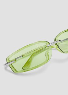 A sleek rectangular silhouette with lenses overlayed on the wrapped frames. Frames are made with combination of durable, lightweight plastic that outlines the silhouette and striking metal details on the nose bridge and temples. Comfortable acetate eartips provide a secure fit. Metal frames with green lenses. Bonnie Clyde, Green Lenses, Metal Frames, The Nose, Nose Bridge, Metal Frame, Sale Items, Lenses, Bridge