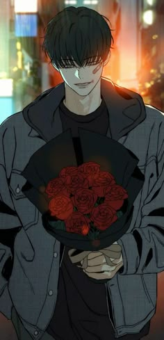 a man holding a bunch of red roses