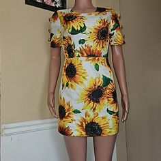 Unique Mini Dress. Has Sunflower Gems On Arms. If More Pics Are Needed, Please Let Me Know! Yellow Sundress With Sunflower Print For Summer, Yellow Daisy Print Summer Dress, Yellow Mini Floral Dress For Summer, Yellow Mini Floral Summer Dress, Yellow Mini Floral Dress For Spring, Yellow Floral Mini Dress For Spring, Casual Yellow Sunflower Print Dress, Yellow Floral Mini Dress For Garden Party, Casual Yellow Floral Dress For Brunch