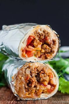 two burritos cut in half and stacked on top of each other