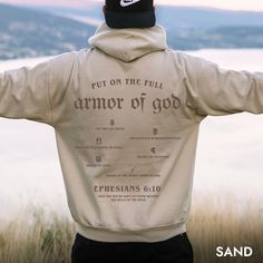 "Equip yourself with the power of faith in this stylish hoodie featuring the full Armor of God, adorned with swords, a crown, and a reminder of the unwavering protection you carry. * Q U I C K * F A C T S * ✺ 100% preshrunk cotton ✺ Wash (inside out) and dry normally (on cool for best results) * S I Z I N G * ✺ Sizing is unisex so runs like men's, though not overly large ✺ Most women find their typical size works best, since they are meant to fit a touch loose ✺ For an oversized look size up 1-2+ sizes! ✺ Size guide and fit: SIZE / WIDTH / LENGTH (in inches) S W20\" L27\" M W22\" L28\" L W24\" L29\" XL W26\" L30\" 2XL W28\" L31\" 3XL W30\" L32\" * H O W * T O * O R D E R * ✺ If you are unsure of which size to order, please refer to the tshirt measurements shown in the photos (or text above Christian Aesthetics, Tshirt Measurements, Christian Clothes, Christian Crewneck, Christian Merch, Christian Streetwear, God Christian, Armor Of God, Christian Clothing