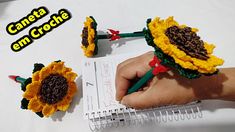 crochet sunflowers are being made with yarn