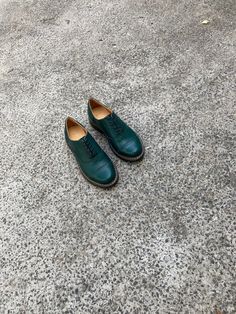 "These women's shoes, known as Brogue Oxfords Tie Shoes, are made of soft dark green leather, giving them a bold and unique look. The intricate brogue detailing on the leather adds a touch of sophistication and refinement to these women shoes, making them perfect for formal occasions or business settings. The shoes feature a comfortable rubber sole, making them versatile enough for any occasion, whether it's a casual weekend outing or a formal business meeting. With their striking dark green color and timeless brogue design, these shoes are sure to become a statement piece in any fashion-forward woman's wardrobe. Key features: 1. Handcrafted in our workshop in Kyiv. 2. Made from 100% natural soft leather. 3. Removable insole, so you can use your own orthopedic insole. 4. Fits true to size Wingtip Leather Shoes For Derby In Fall, Fall Derby Wingtip Leather Shoes, Green Round Toe Oxfords For Office, Green Leather Shoes With Brogue Detailing For Business, Green Dress Shoes With Rubber Sole For Office, Green Wingtip Business Dress Shoes, Office Green Dress Shoes With Rubber Sole, Green Office Dress Shoes With Rubber Sole, Green Leather Shoes With Leather Sole For Fall