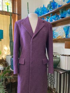 Ralph Lauren Polo Coat, Size 8, Woven wool, Maxi Coat, Made in the USA,Purple coat Presenting a stunning vintage woven wool coat via Ralph Lauren POLO era. Deep lavender. Ralph Lauren POLO was clearly the leading American luxury brand from the 70s to 80s and this tailored coat is an excellent example.  Buttons under placket, fully lined, deep kick pleat in the back, fitted with torso seams, Made in the USA! Near mint condition, the top button hole could use a few stitches. Shoulders: 17 Armpit to same: 18 (36 Chest) Waist; 32 Hips: 30 Length: 52 Wool Maxi Coat, Polo Coat, Purple Coat, Tailored Coat, Maxi Coat, Button Hole, Kick Pleat, Ralph Lauren Polo, Wool Coat