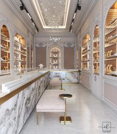 the interior of a shoe store with marble counter tops and gold trimmings on the walls