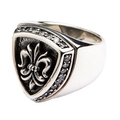 925 Sterling Silver Diamond Fleur De Lis Ring  100% solid 925 sterling silver  Stamp.925 trademark inside the band  Ring weight: 23g   Ring face measures: 21mm x 25mm  No. diamond clear stones: 25   A symbol of unity, this masculine dress ring features the recognisable symbol of the Fleur De Lis. Long since recognised in the Catholic church, this three leaf lily has been bound together to symbol a united front within French history. Here, it sits proudly from a darkened silver shield background Silver Engraved Diamond Ring With Polished Finish, Silver Diamond Engraved Ring With Polished Finish, Silver Signet Ring With Diamond Accents, Silver Signet Ring With Diamond Accents For Promise, Classic Silver Engraved Ring With Diamond Accents, Silver Engraved Ring With Diamond Accents In Sterling Silver, Silver Engraved Diamond Ring With Vs Clarity, Silver Diamond Engraved Ring With Vs Clarity, Silver Signet Ring With Brilliant Cut Fine Jewelry