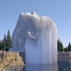 an artistic sculpture is shown in the water