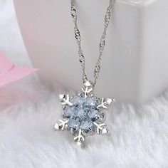 Specification:Gender: WomanColor: Sky Blue , Sea BlueMaterial: Zinc Alloy, Zircon, CrystalThickness: 0.5cm (0.19")Length: 23cm + 5 (extend chain )Pendant Diameter: 2cm ( 0.78")Net Weight: 6gOccasion: Party, Birthday, Anniversary, Gift, Daily Wearing etc.Package includes: 1pcs x Necklace Notes:1. Please note the photo does not show actual size, please refer to Description for size details. 2. Please allowed 1-5mm differences due to manual measurement, thanks.3. Due to the difference between diffe Cheap Blue Necklaces With Star Charm, قلادات متدلية, Snowflake Necklace, Snowflake Pendant, Magical Jewelry, Vintage Lady, Geek Culture, Fantasy Jewelry, Girly Jewelry