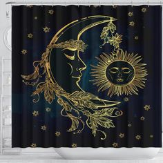 a shower curtain with an image of the sun and moon on it's face