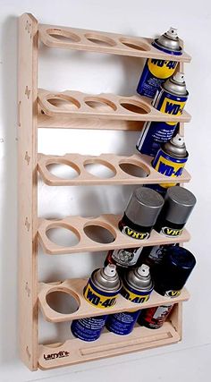 a wooden rack with cans and cans on it