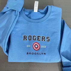 Rogers 1918 Embroidered sweatshirt; Avenger Marvel embroidered sweatshirt; Rogers 1918 crewneck; gift for crewnec; Rogers sweatshirt - MrEmbroideryGifts Personalized Sweatshirts, Short Text, Embroidery Sweatshirt, Personalized Embroidery, Gildan Sweatshirts, Sweatshirt Vintage, Custom Sweatshirts, Embroidered Sweatshirt, Embroidery Ideas