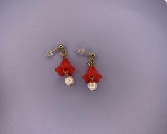 Red flower earrings to pair with your outfit on sunny or rainy days ❤️ Red Flower-shaped Jewelry For Spring, Red Flower Jewelry For Spring, Red Flower-shaped Spring Jewelry, Single Summer Flower Earring, Cute Red Flower Jewelry, Red Spring Earrings, Red Jewelry With 3d Flower Details, Red Flower Drop Earrings, Red Flower-shaped Earrings For Spring