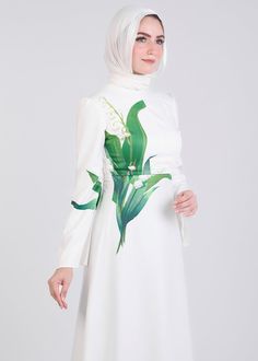 Step into elegance with our Lily-Inspired Flared Sleeve Maxi Dress, crafted from durable crepe. This ivory-toned dress features a unique lily floral motif on the bodice, evoking a sense of nature-inspired beauty. The flowing bell sleeves add a touch of sophistication, perfect for formal occasions or chic daytime wear. The full-length design ensures modest coverage while maintaining a graceful silhouette. Elevate your wardrobe with this timeless piece that seamlessly blends luxury and comfort.