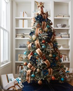 a decorated christmas tree in a living room