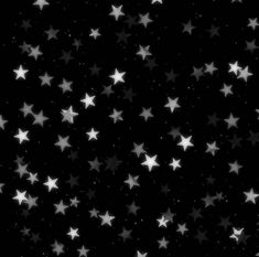 many white stars are scattered in the dark night sky, creating an abstract pattern on black background