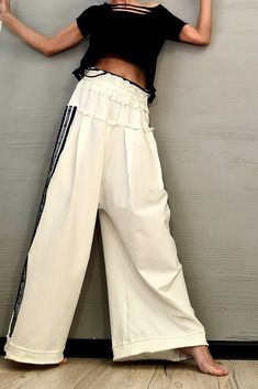 "New collection Avant Garde Loose Pants, Harem Pants Women, Extravagant Cotton Pants, Casual Pants, Punk Pants, Loose Pants ❤️ Extravagant designs and high quality fabrics! ❤️ Materials & Care Cotton Hand wash at low temperatures. Do not machine dry. Do not iron. Do not dry clean! ❤️ Sizing We can make your piece from XS to 5XL! Everything in the shop can be also made according to your measures free of charge! ❤️ Shipping ✈ Ready to ship The time I need to prepare an order for shipping varie