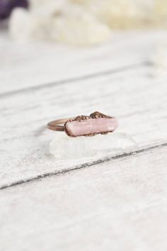 Your raw crystal ring collection is not complete without a statement, raw pink tourmaline ring. Handmade with healing crystals and natural stones, this copper jewelry awakens the wild woman. The raw pink tourmaline jewelry is made with electroformed copper, making each piece unique and one of a kind, just like you. Embrace your intuitive nature and click through to see more raw gemstone jewelry! Bohemian Rings With Raw Stone For Healing, Bohemian Raw Stone Rings For Healing, Bohemian Raw Stone Healing Rings, Bohemian Rings With Raw Stone, Minimalist Crystal Ring For Healing, Adjustable Raw Stone Crystal Ring For Healing, Raw Tourmaline Jewelry, Raw Pink Tourmaline, Pink Tourmaline Jewelry