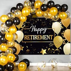 a happy retirement party with balloons and streamers in gold, black and white colors