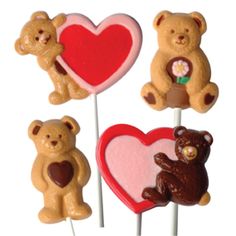 four teddy bear lollipops with hearts and bears on them for valentine's day