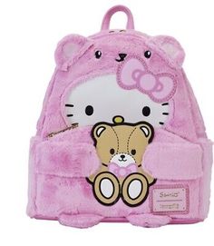 a hello kitty backpack with a teddy bear on it