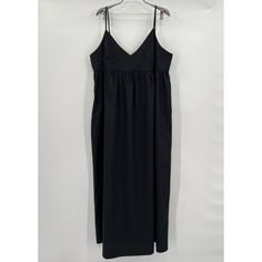 Quince Women's Organic Cotton Sleeveless Maxi Dress - New With Tags Color: Black Size: Small 100% Organic Cotton Cotton Poplin Fabric Functional Side Seam Pockets Smocked Back Creates A Comfortable Yet Flattering Fit Adjustable Straps Maxi Length Unlined V-Front Neckline Measurements, Approximate 18" Pit-To-Pit, Laying Flat 16.5" Bust, Laying Flat 51" Length Black V-neck Sleeveless Dress For Daywear, Black Sleeveless V-neck Dress For Daywear, Black Lined Dress For Daywear, Sleeveless Black Midi Dress For Daywear, Black Sleeveless Midi Dress For Daywear, Sleeveless Black Lined Maxi Dress, Black Sleeveless Lined Maxi Dress, Black Sleeveless Sundress For Daywear, Casual Black Sleeveless Lined Dress