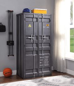 two lockers in the corner of a room with a basketball ball on the floor