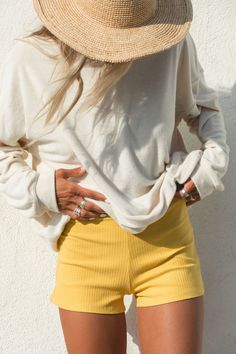 Our Post Dip Fitted Ribbed Shorts in marigold offer a stretchy fit that hugs your body in all the right places. Stretch Cotton Ribbed Shorts, Relaxed Stretch Solid Bottoms, Casual Mustard Bottoms For Loungewear, Mustard Stretch Casual Bottoms, Casual Stretch Mustard Bottoms, Mini Jumpsuit, All The Right Places, Ribbed Shorts, Strapless Tops