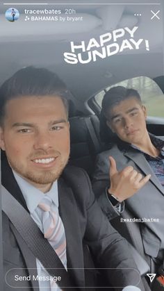 two men sitting in the back seat of a car with happy sunday written on it