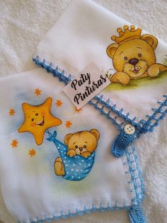 two baby blankets with teddy bears on them