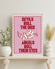 a pink poster with the words devil's roll the dice angels roll their eyes