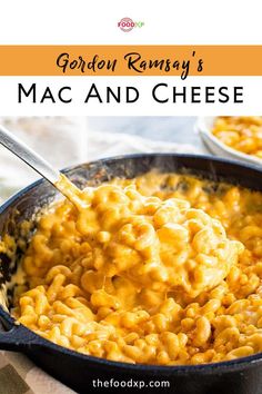 a skillet filled with macaroni and cheese on top of a checkered table cloth