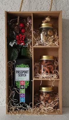 an open wooden box filled with lots of different types of food and drinks in it