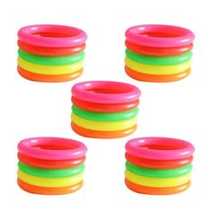 six neon colored rings are stacked on top of each other