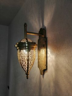 a wall light that is on the side of a wall