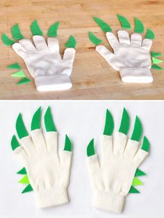 the hands are made out of paper and have green leaves on them, as well as white gloves