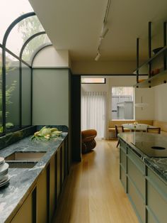 the kitchen is clean and ready to be used as a dining room or office space